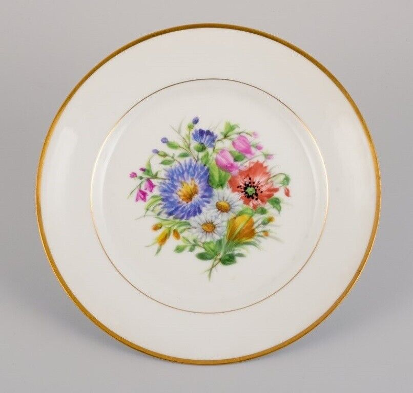 Bing  Grøndahl seven porcelain lunch plates with flowers and gold decoration