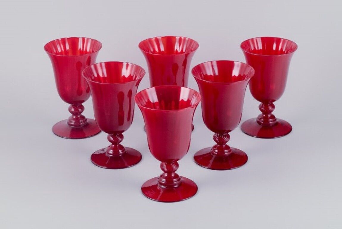A set of six large wine glasses in red glass Sweden Late 20th century