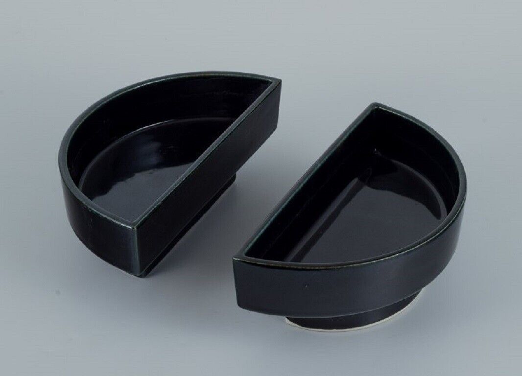 European studio potter Two-piece unique bowl in black glaze Late 1900s