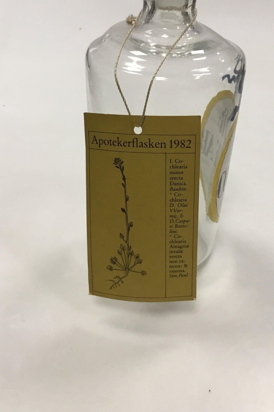 Holmegaard pharmacy jar with text SPIR COCHLEAR from 1981