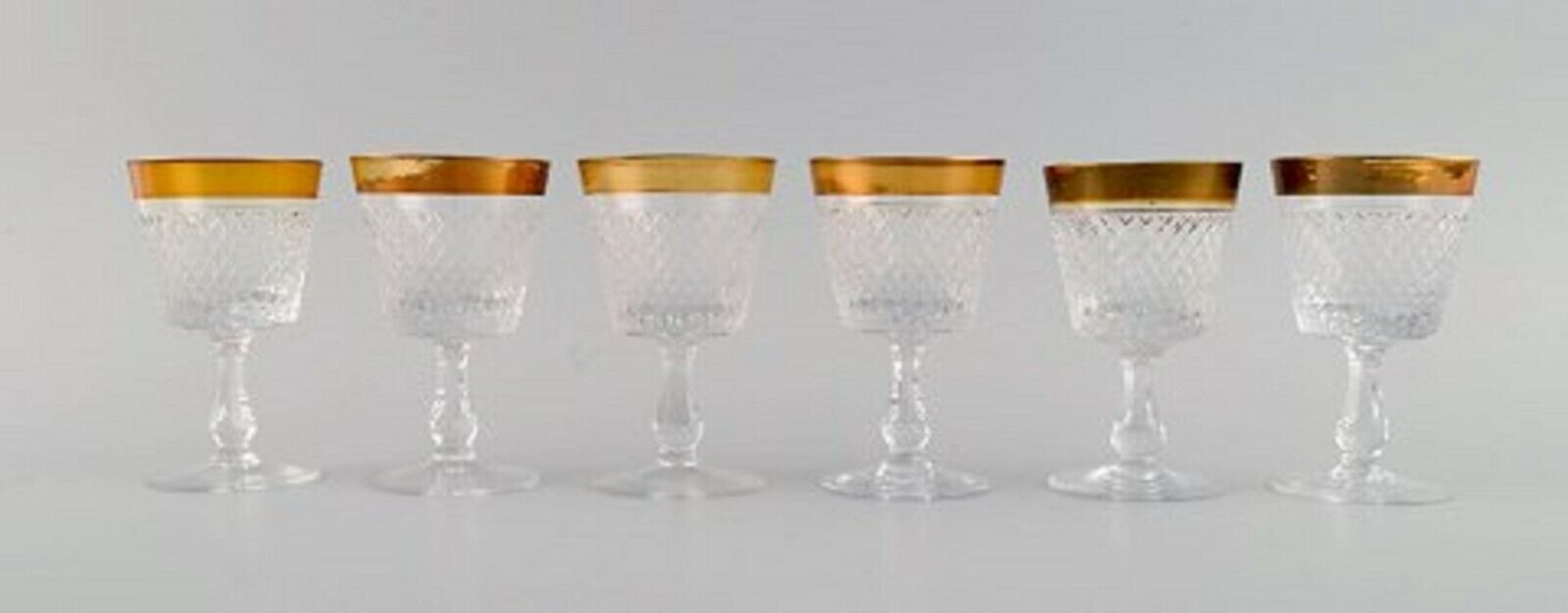 14 glasses in mouth-blown crystal glass with gold edge France 1930s