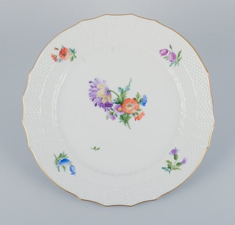 Royal Copenhagen four Saxon Flower dinner plates in porcelain