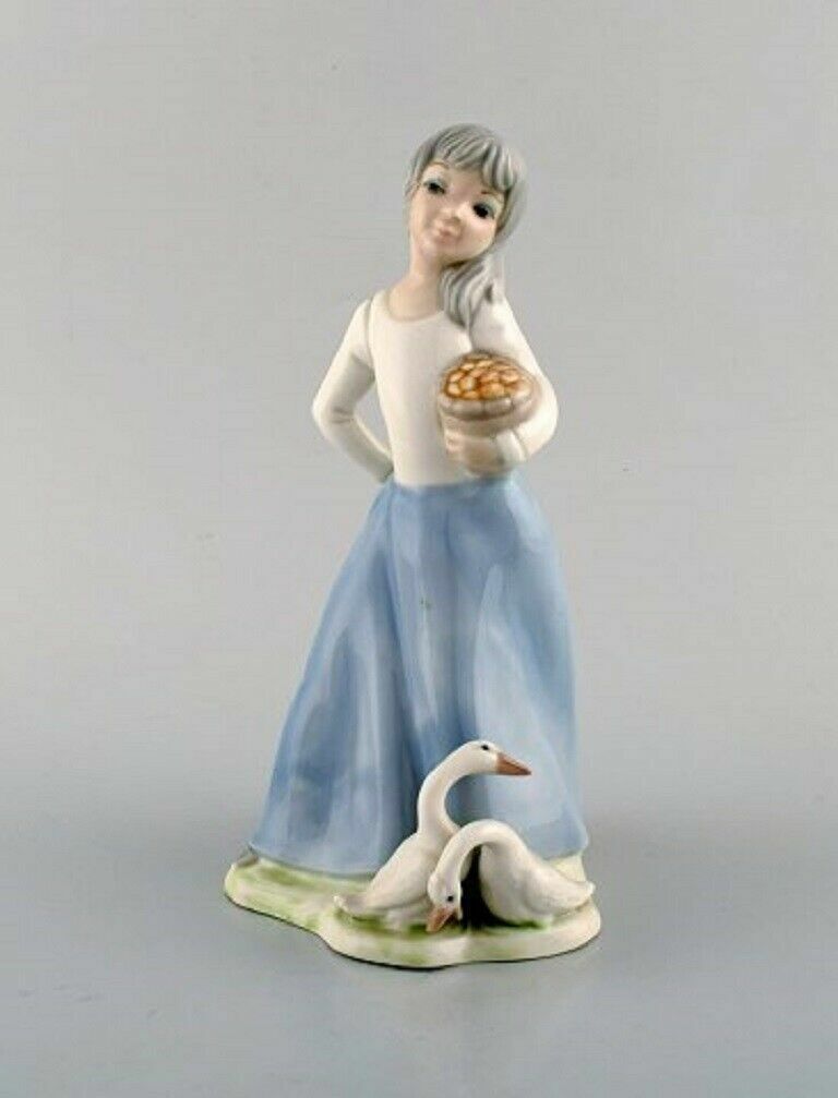 Lladro Tengra and Zaphir Spain Four porcelain figurines of children