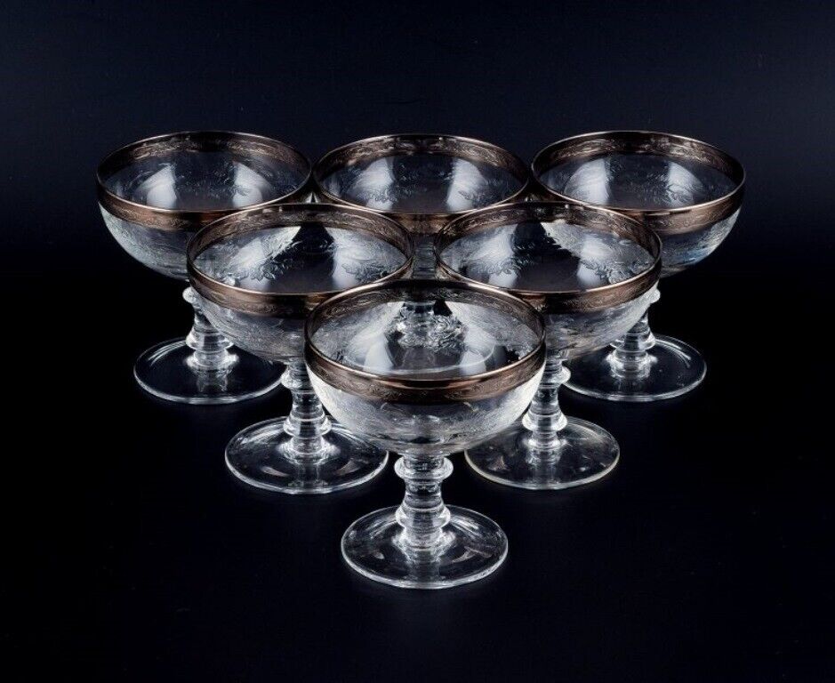 Murano Italy Six mouth-blown engraved champagne glasses with silver rim