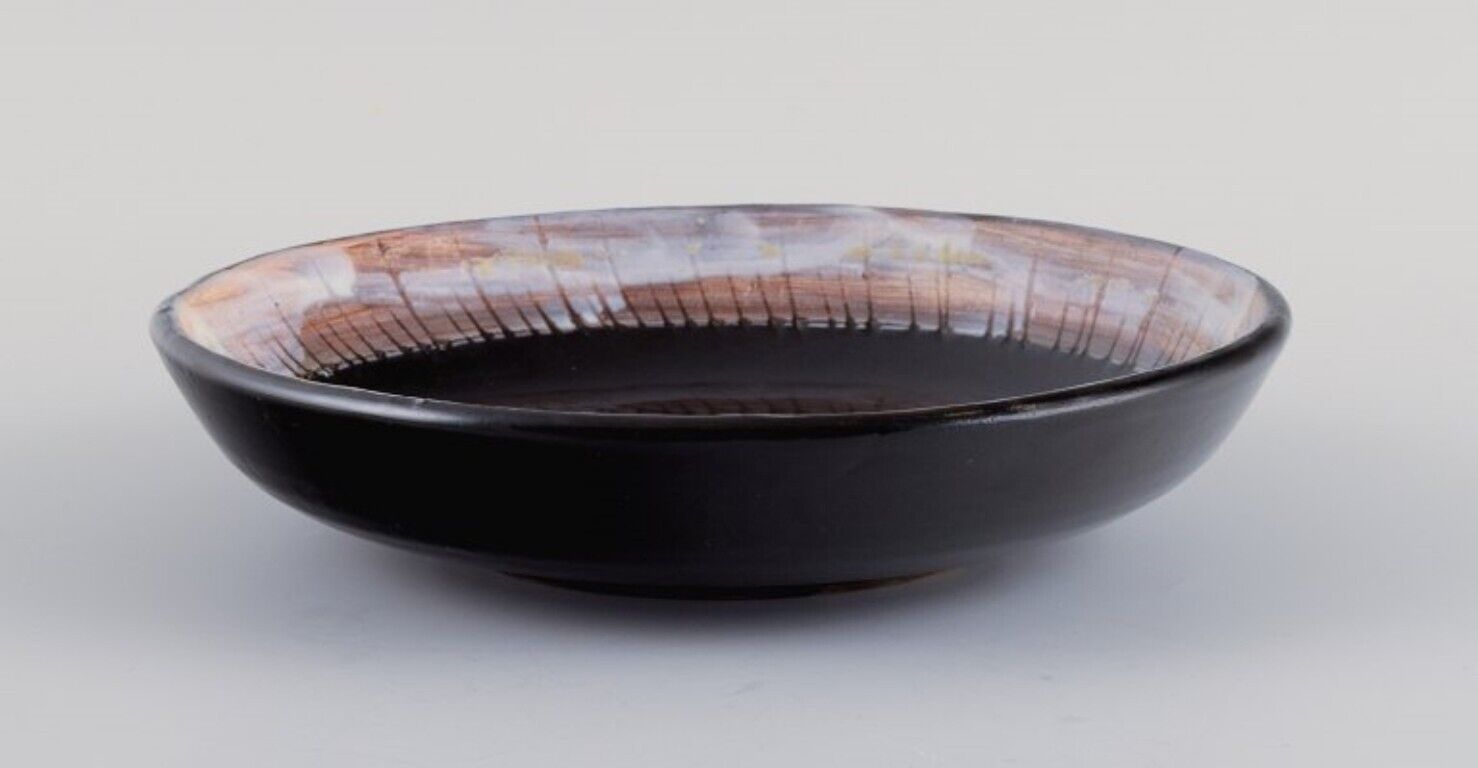 Vallauris France unique ceramic bowl in black glaze with female motif