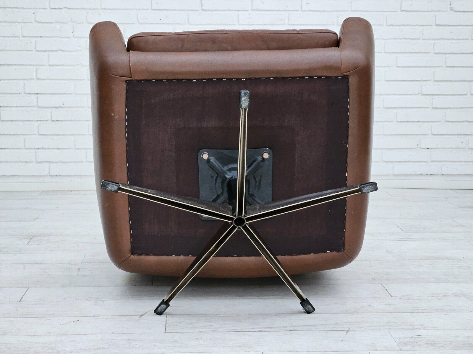 1970s Danish swivel chair with footstool original good condition leather