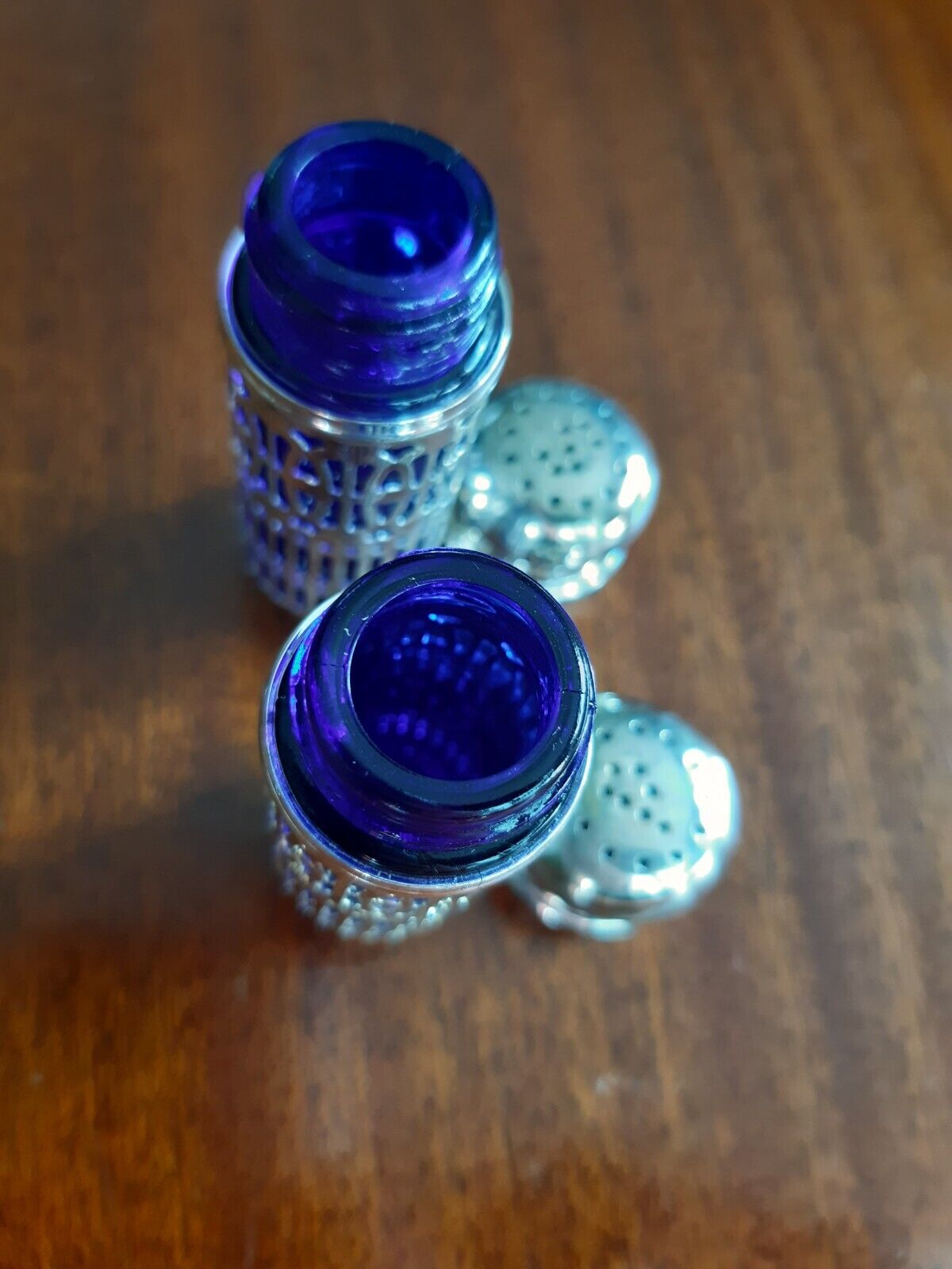 Salt and pepper metal and cobalt blue glass shaker