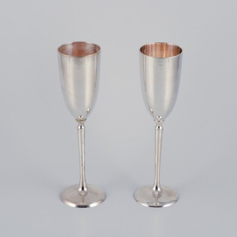Gunilla Lindahl Scandia PresentTwo large champagne flutes in plated silver