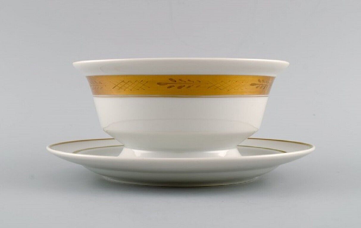 Royal Copenhagen service no 607 Porcelain sauce bowl Gold border with foliage