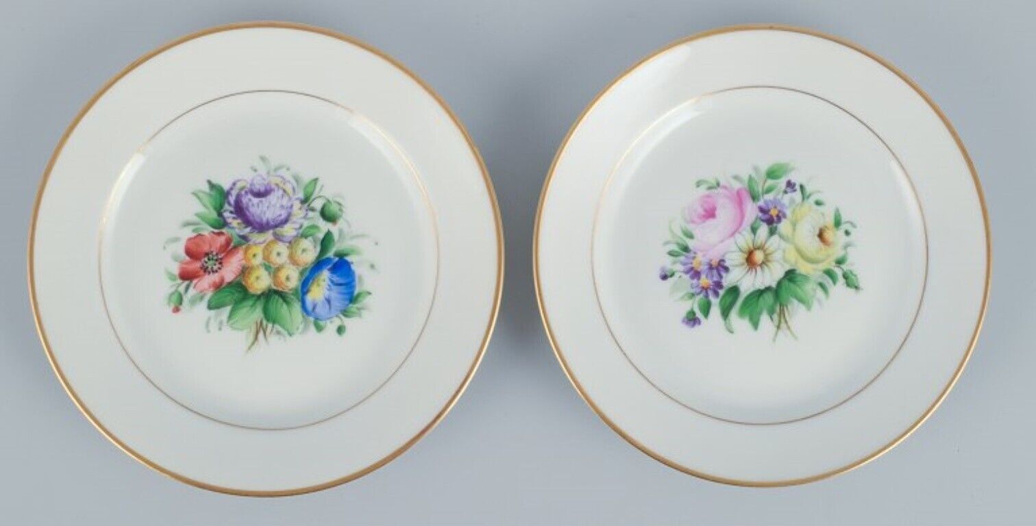 Bing  Grondahl set of fourteen plates in porcelain with flowers