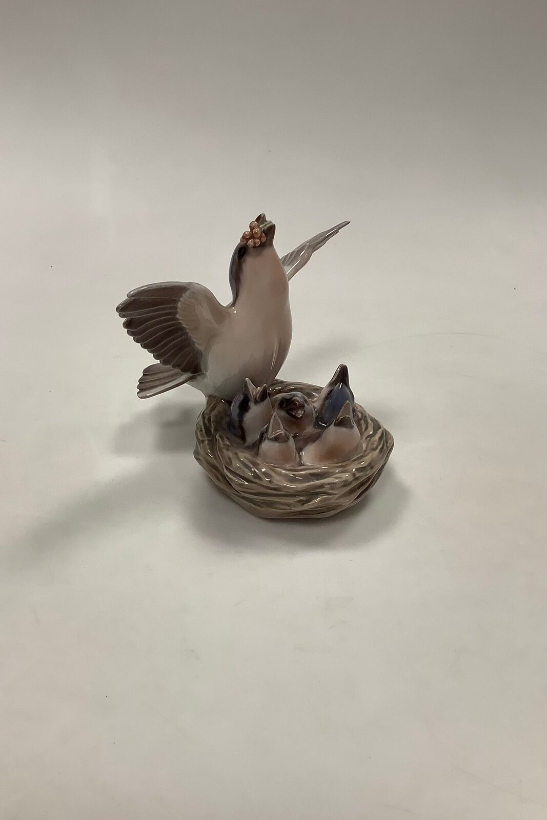 Dahl Jensen Figure of bird on nest DJ No 1349