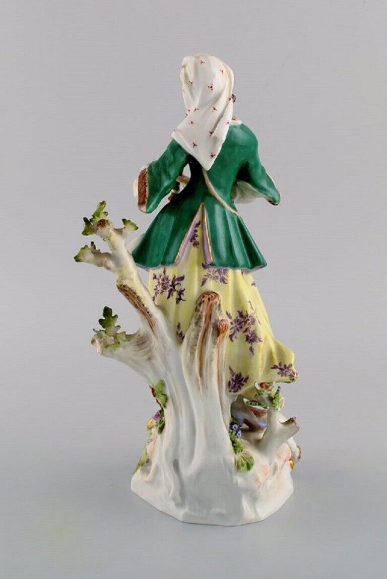 Antique Meissen porcelain figurine Woman playing flute Late 19th century