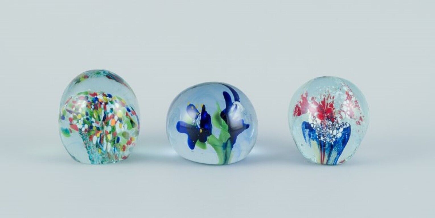 Scandinavian glass artist Set of three paperweights in art glass Flower motifs