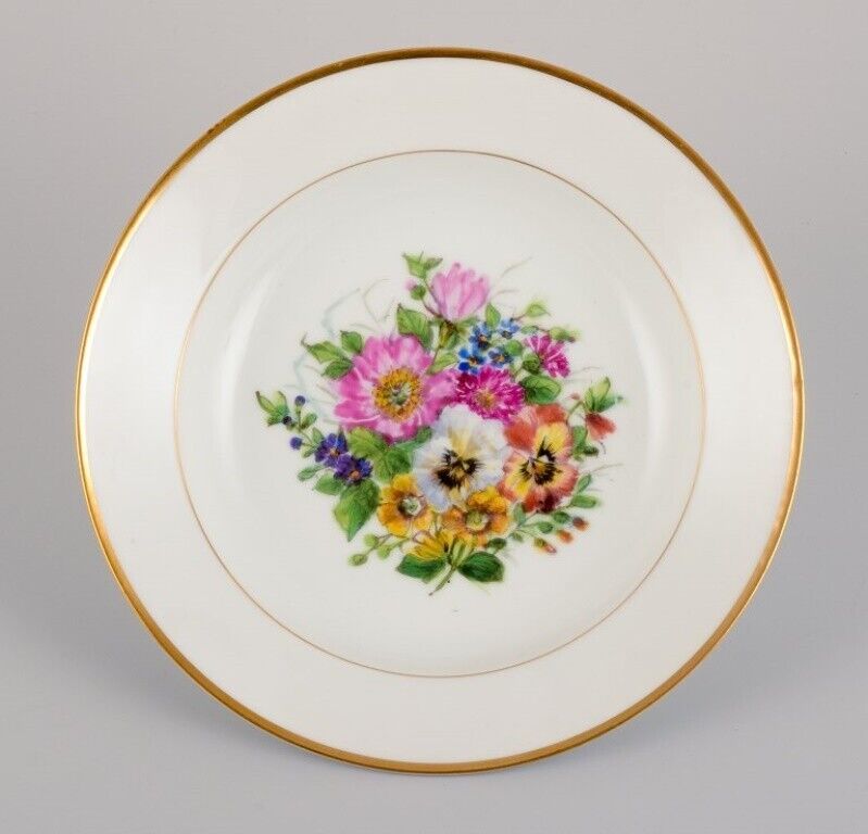 Bing  Grøndahl six deep plates in porcelain with flowers and gold decoration