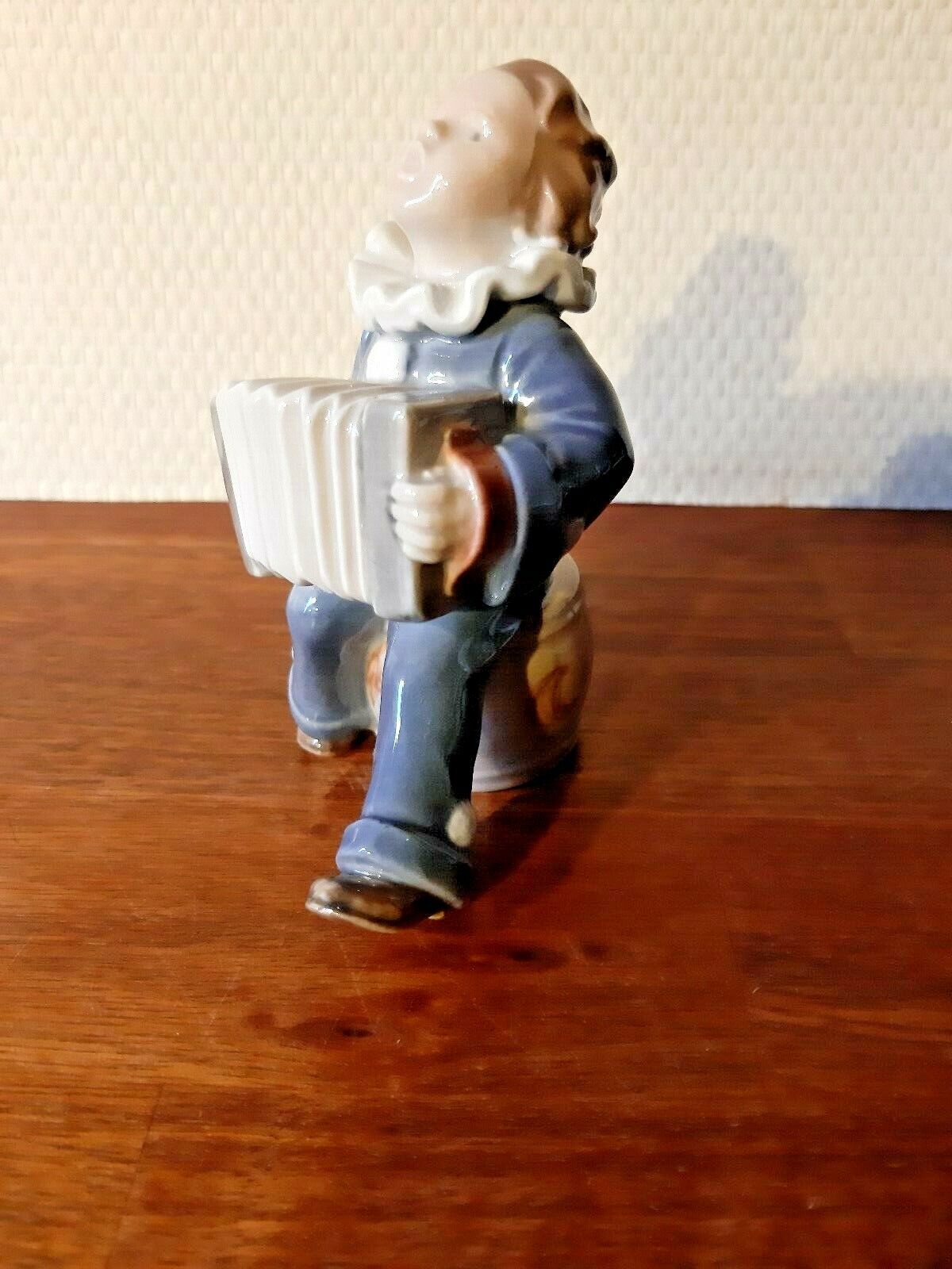 CHILD with ACCORDION # 3667 by Ada Bonfils for ROYAL COPENHAGEN Fact 1st