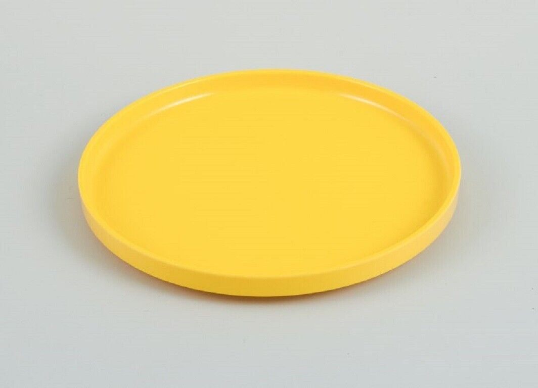 Massimo Vignelli for Heller Italy A set of 4 plates in yellow melamine