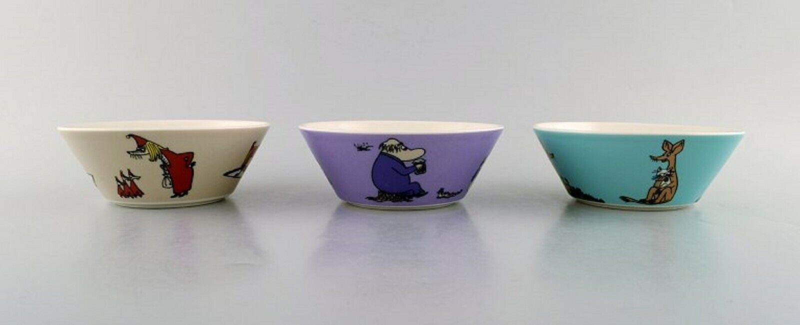 Arabia Finland Three porcelain bowls with motifs from "Moomin" Late 20th C