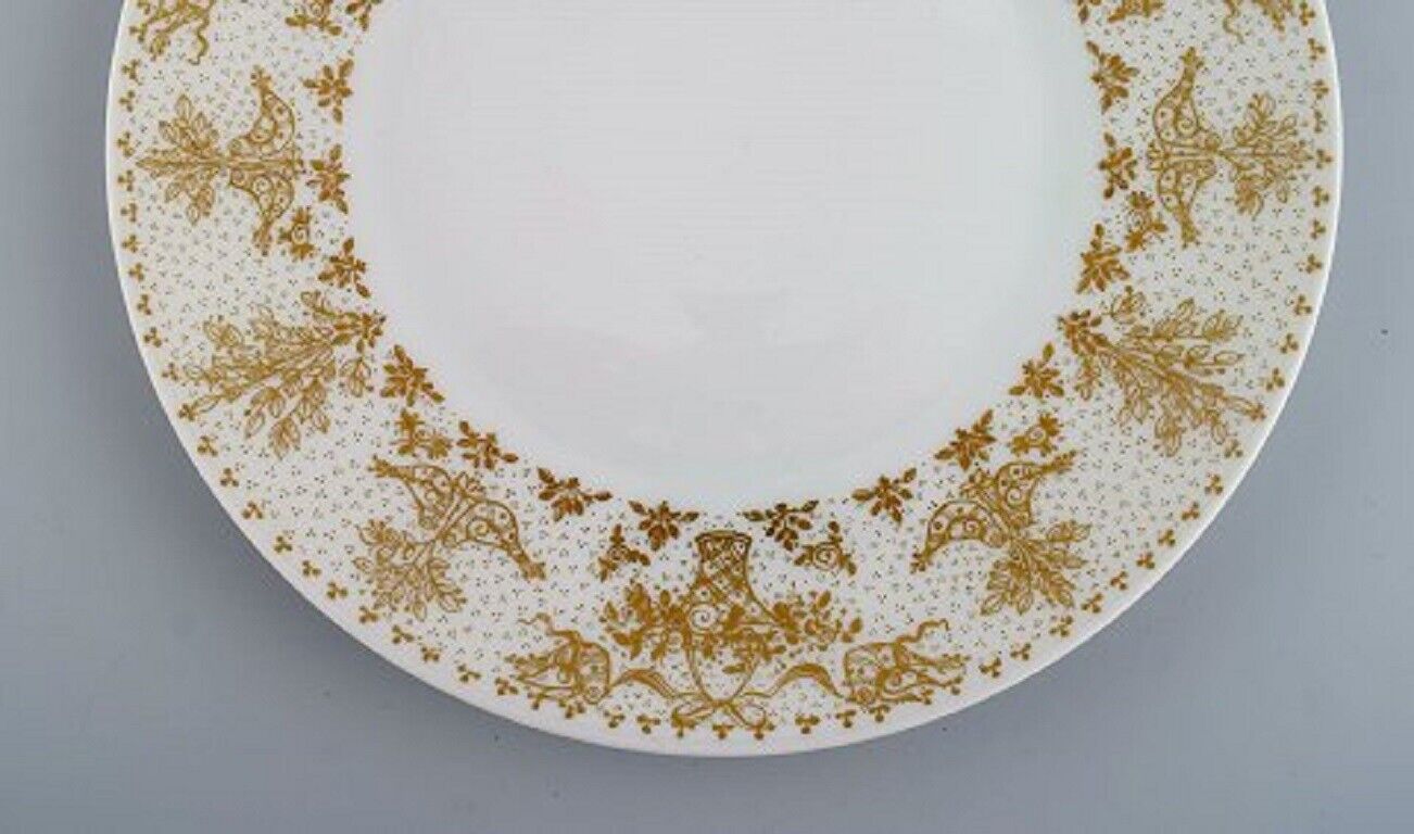 Bjørn Wiinblad for Rosenthal 10 plates in porcelain with gold decoration 1980s