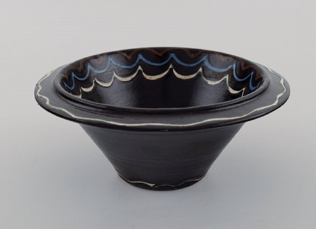 Kähler Denmark Bowl in black glazed ceramics with blue and white waves