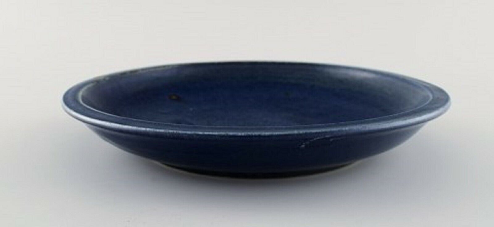 Round Saxbo dish in glazed stoneware Beautiful glaze in deep blue shades