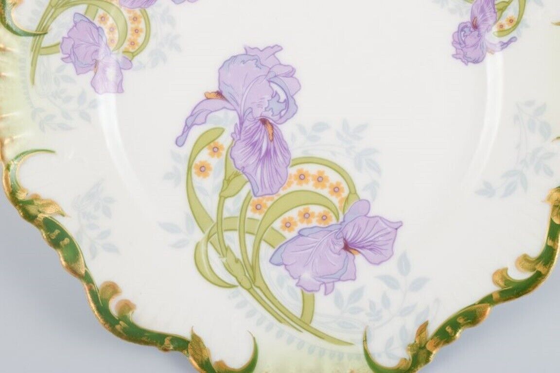 P Dauphin Paris Set of six Art Nouveau faience plates decorated with flowers