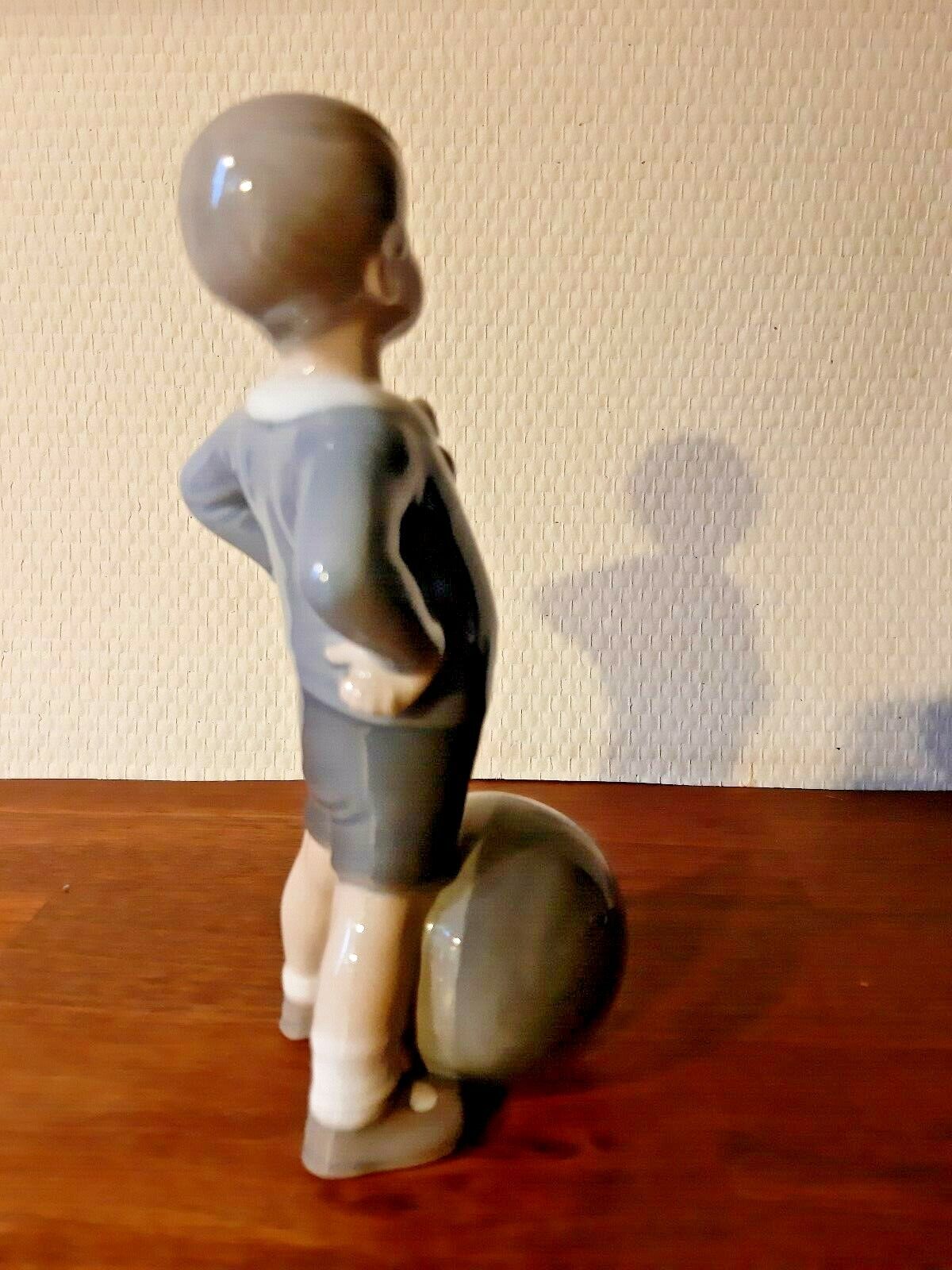 BOY with BALL Figurine  # 3542 by Aage Erhardt for ROYAL COPENHAGEN  Fact 2