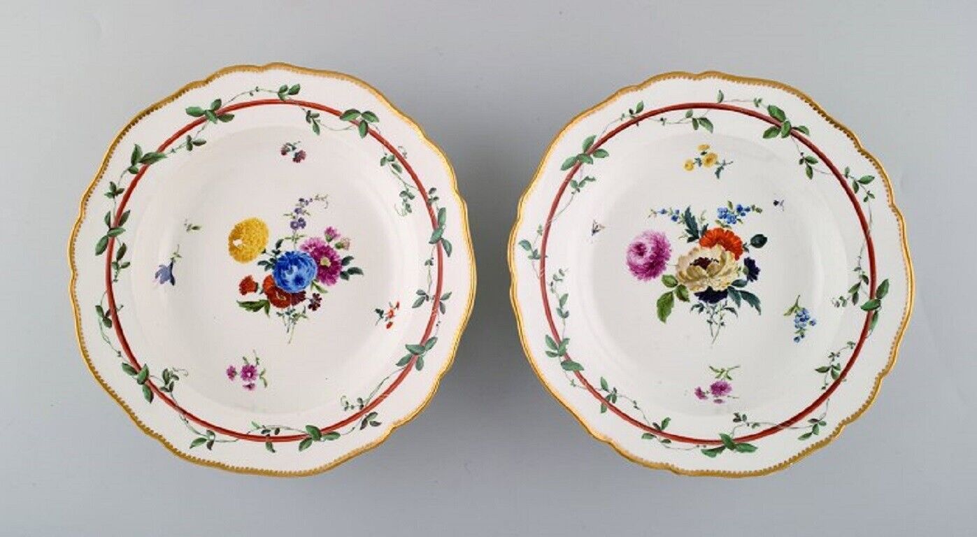 Two antique Meissen deep plates in pierced porcelain with floral motifs