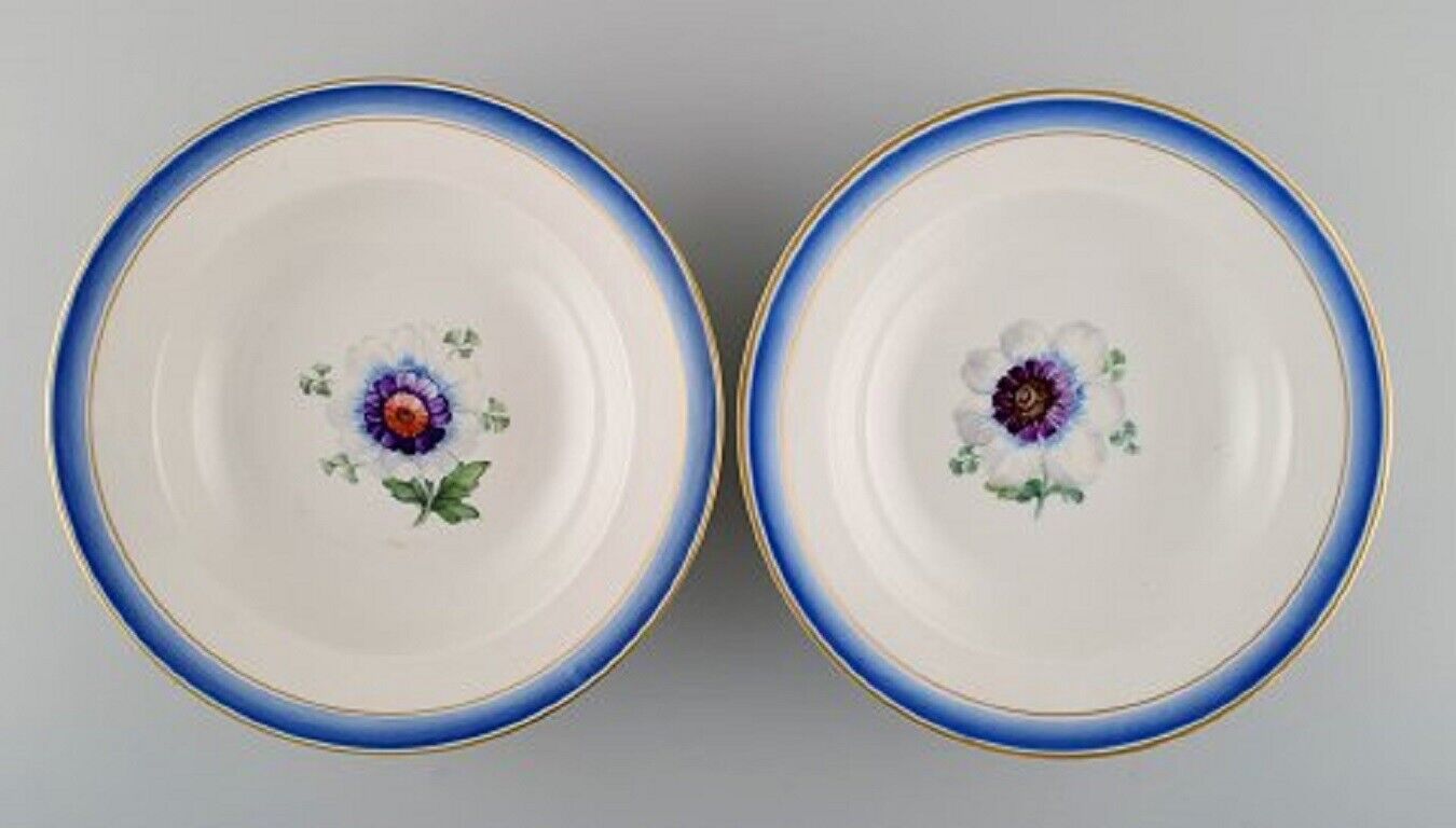 Four antique Royal Copenhagen deep plates in hand-painted porcelain