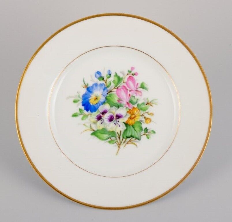 Bing  Grøndahl seven porcelain lunch plates with flowers and gold decoration