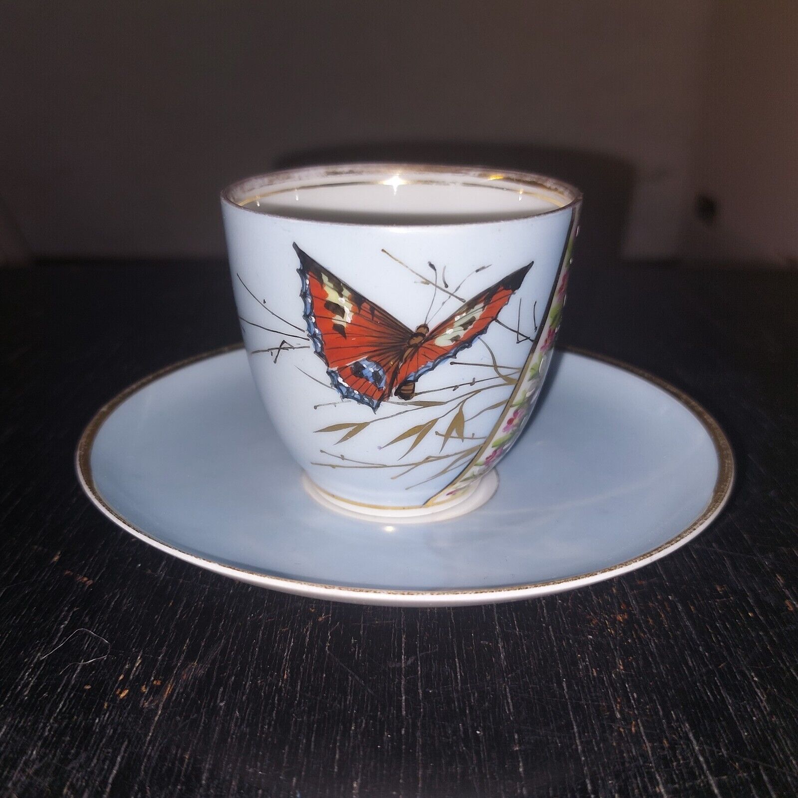 Art Nouveau porcelain cup and saucer from BG with butterfly decoration c 1900