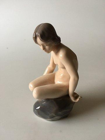 Royal Copenhagen Figurine Girl on Stone No 4027