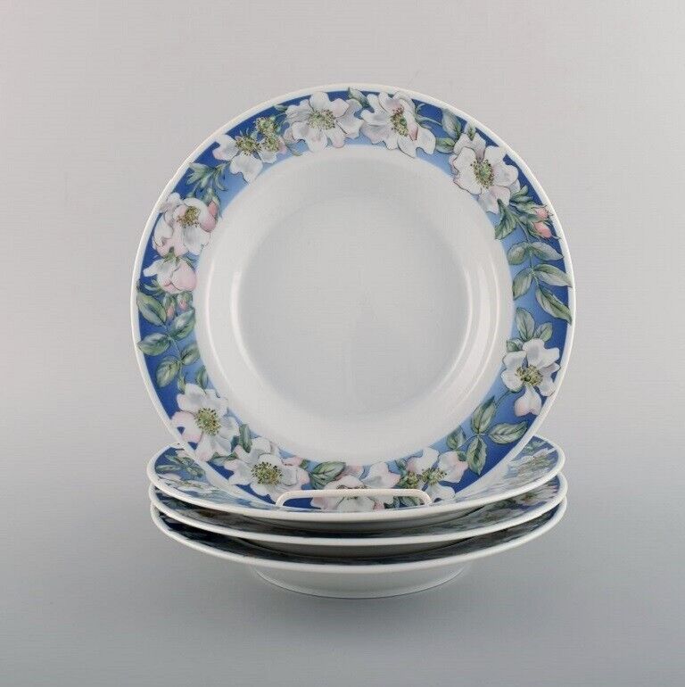 Four Royal Copenhagen White Rose deep plates with blue border white flowers