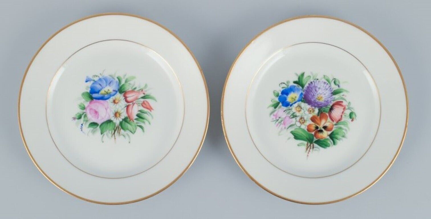 Bing  Grondahl set of fourteen plates in porcelain with flowers