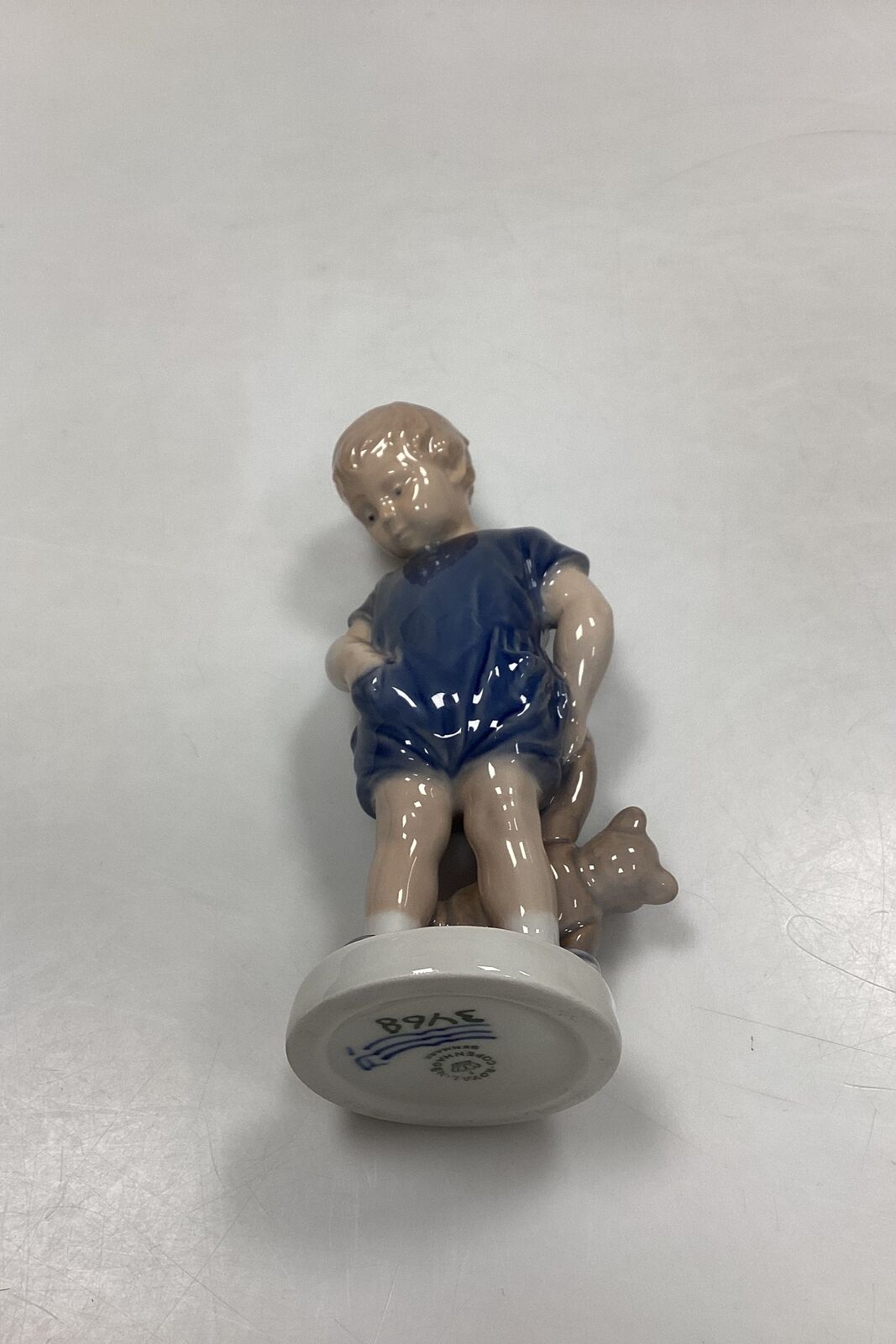 Royal Copenhagen Figurine of Boy with Teddy Bear No 3468