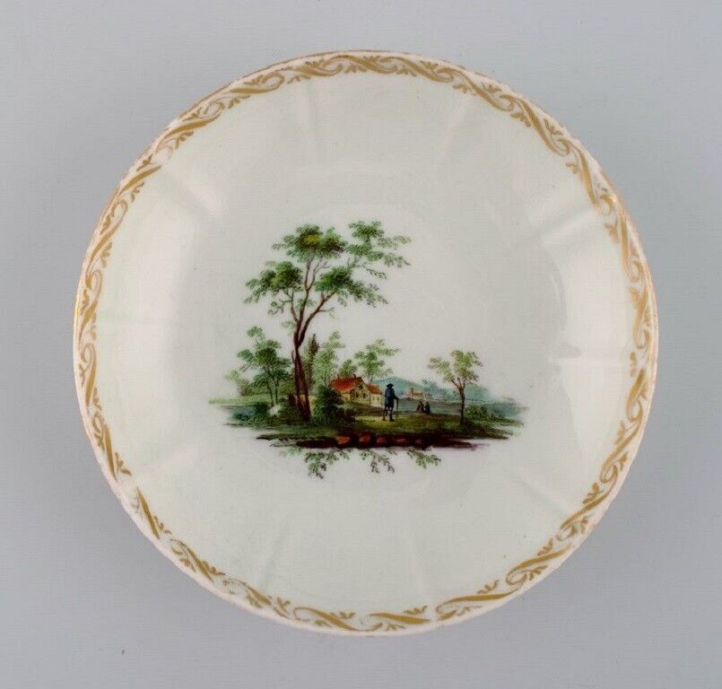 Four antique Royal Copenhagen porcelain bowls with hand-painted landscapes