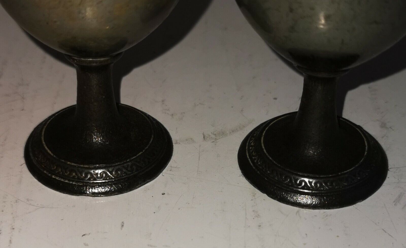 Pair of old English egg cups in pewter from second half of the 19th century