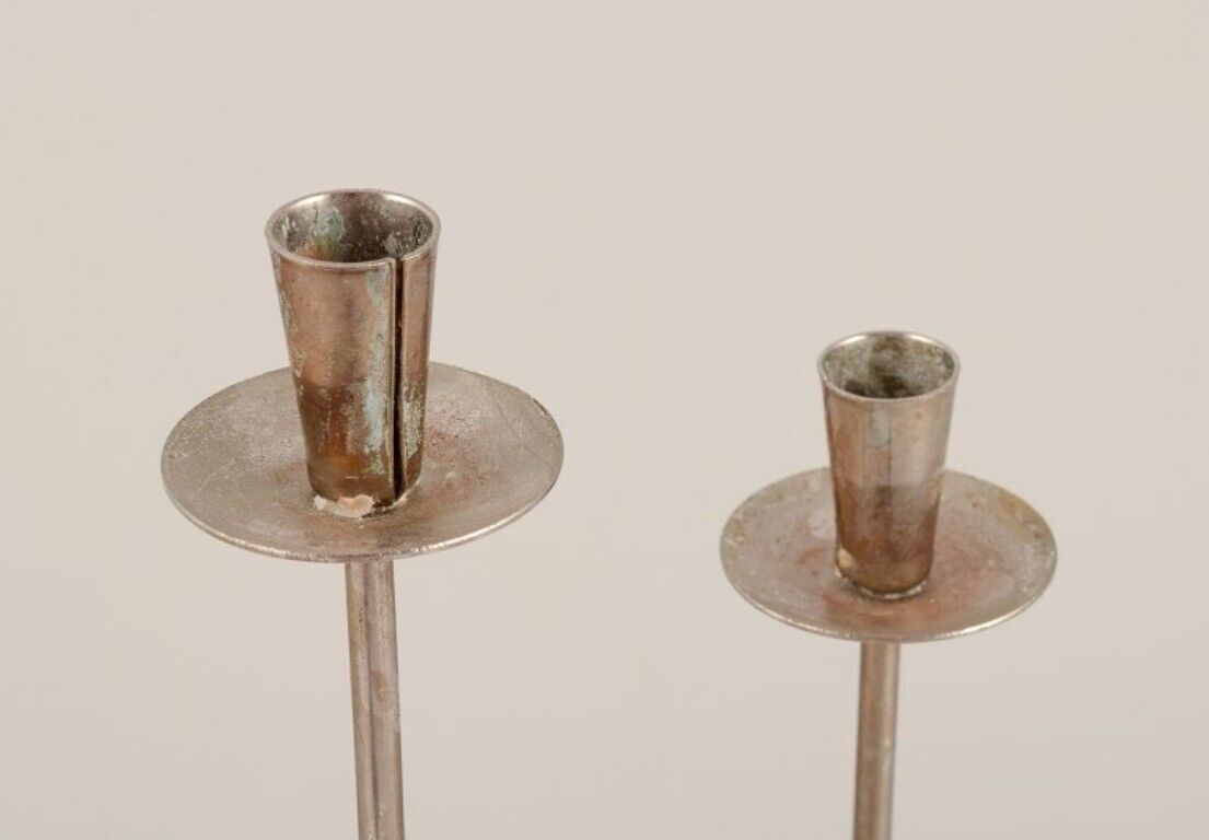 Gunnar Ander for Ystad Metall Sweden Two candle holders in silver-plated brass