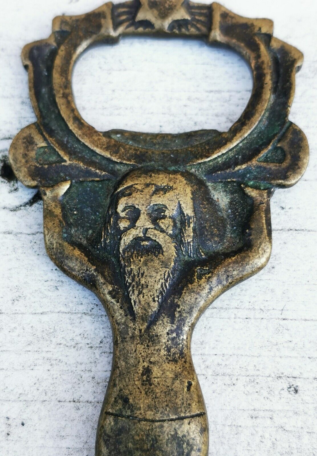 Old figurative gnome pixie Santa Claus bottle opener in brass from c 1930