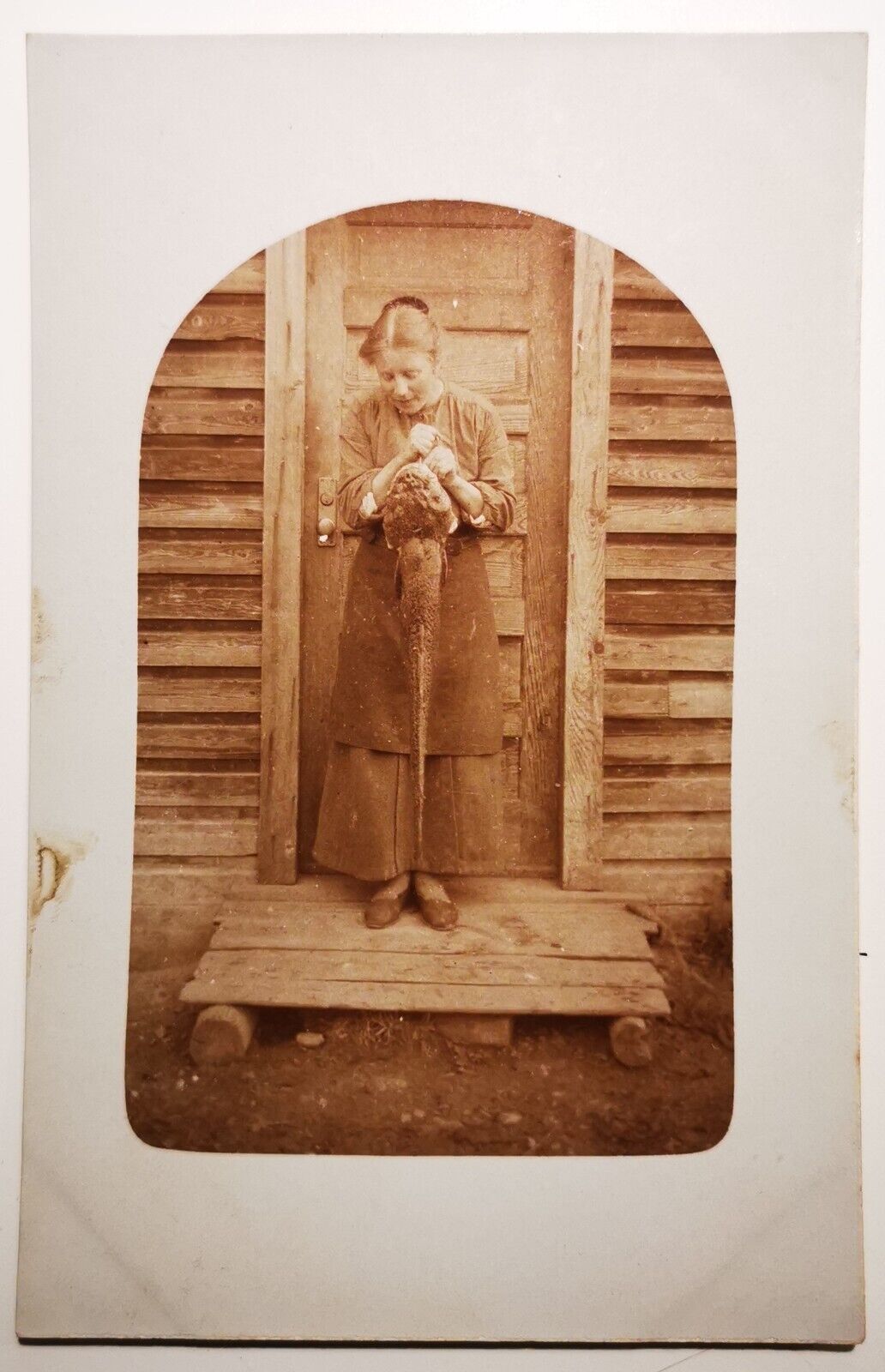 Old photo postcard:  Her husband caught the biggest fish c 1925  pok773