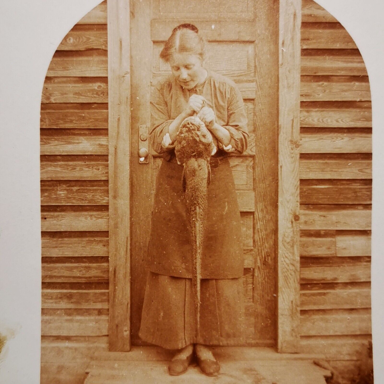 Old photo postcard:  Her husband caught the biggest fish c 1925  pok773