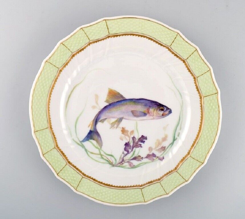 Royal Copenhagen fish plate with green edge gold decoration and fish motif