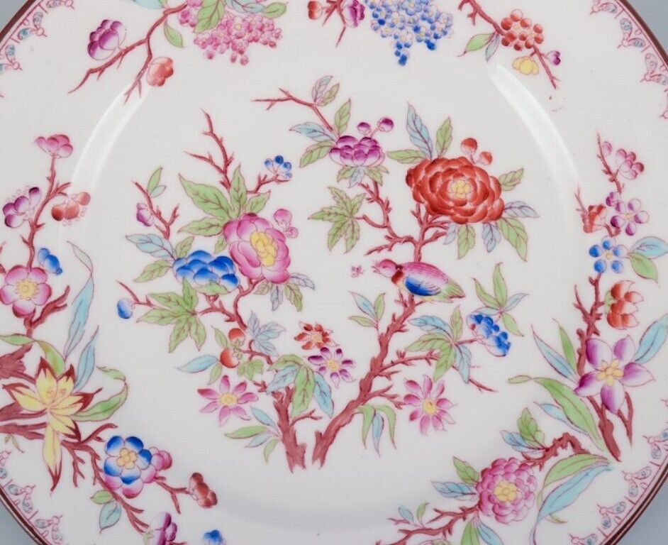 Sarreguemines France a set of six porcelain plates with floral motifs