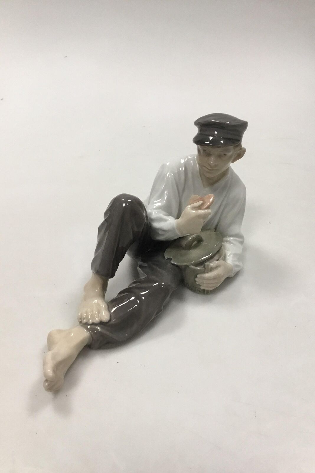 Royal Copenhagen Figurine Boy at Lunch No 865