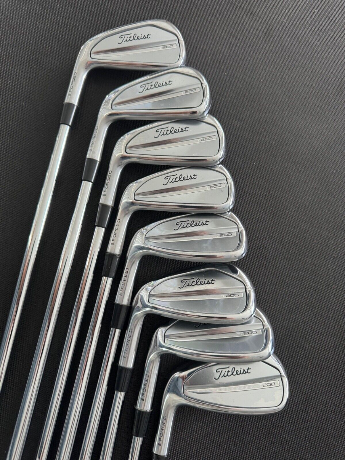 Titleist T200 2023 lefthanded irons 4-pw + gw stiff flex