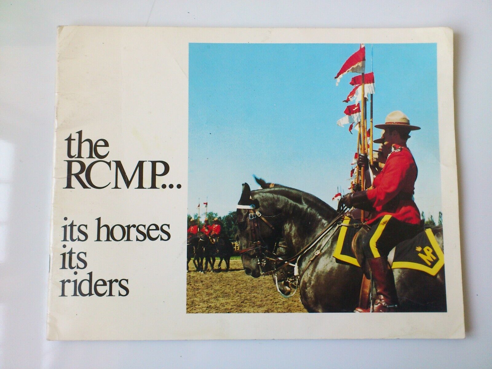 Vintage Canadian souvenir booklet of The RCMPits horses and its riders