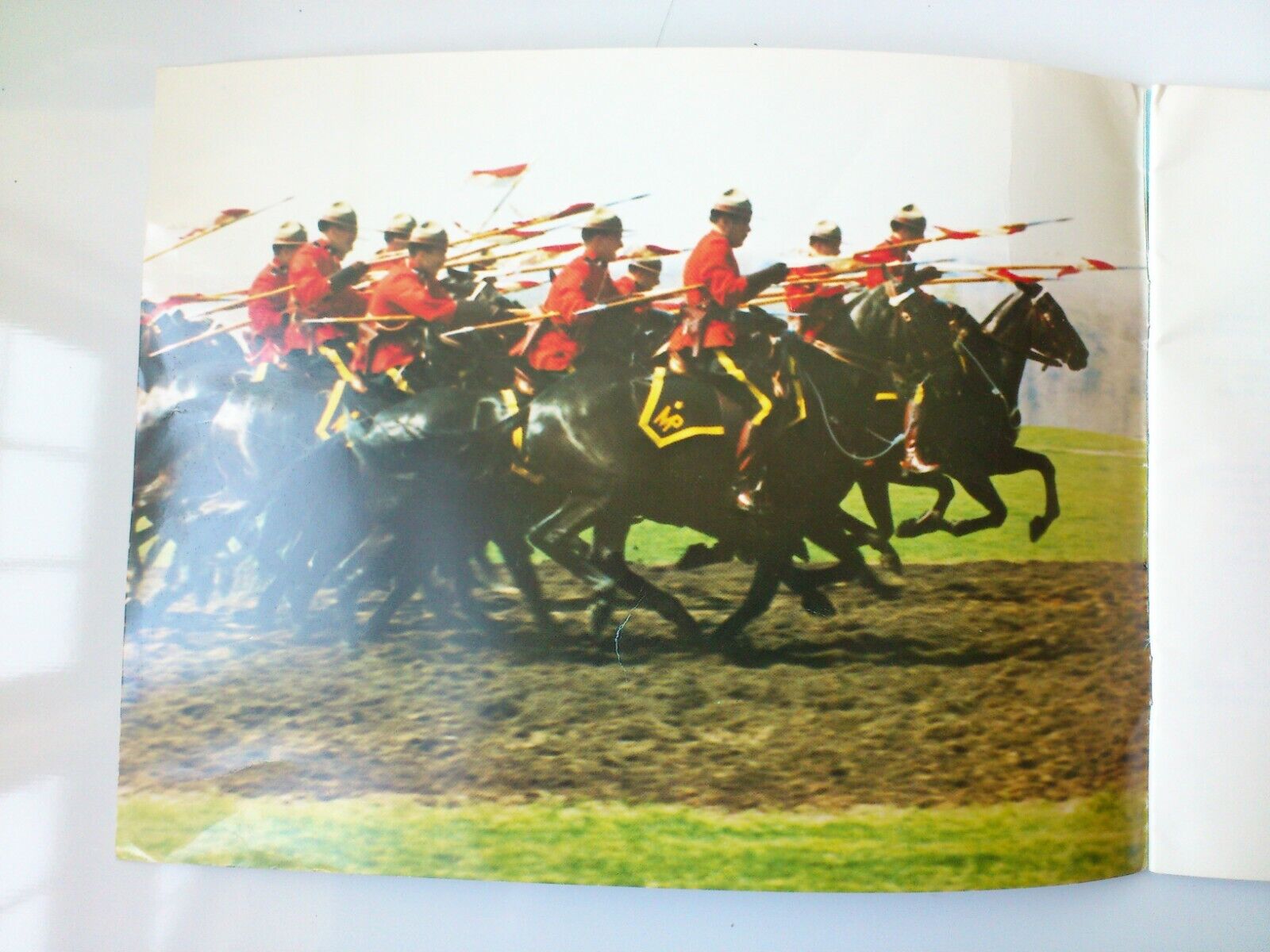 Vintage Canadian souvenir booklet of The RCMPits horses and its riders