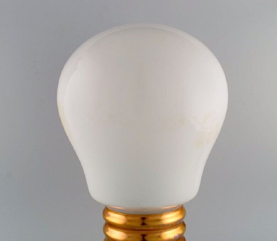 Large table lamp in brass and opal glass shaped like a light bulb 1960s