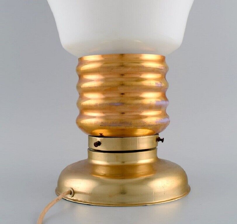 Large table lamp in brass and opal glass shaped like a light bulb 1960s