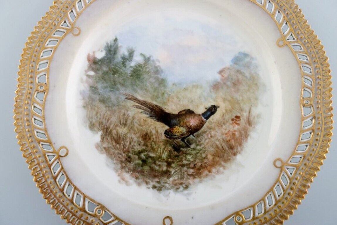 Early and rare Royal Copenhagen Fauna Danica plate in hand-painted porcelain