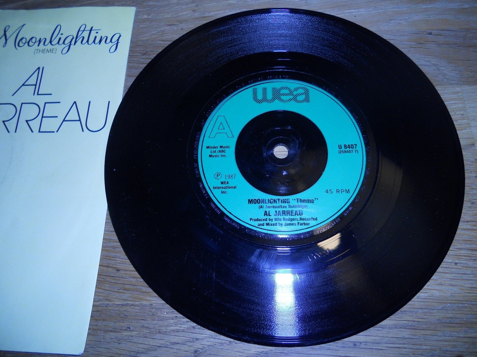 AL JARREAU "MOONLIGHTING (THEME) / GOLDEN GIRL" 1987 UK VINYL SINGLE WEA RECORDS